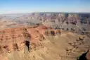 Aerial view over the layered red cliffs of the Grand Canyon on a clear day