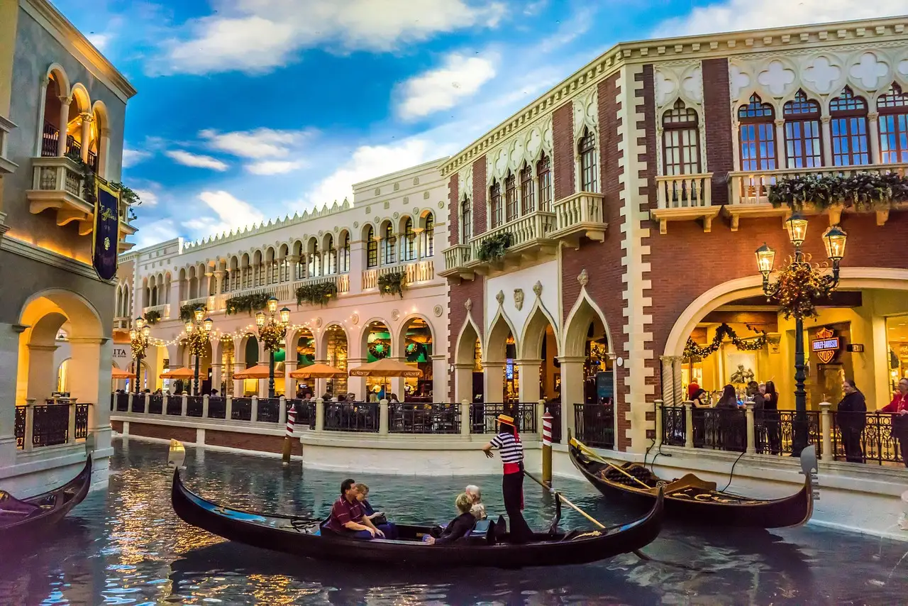 A gondola with passengers on the indoor canal at the Venetian in Las Vegas