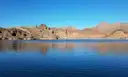 The Colorado River at Willow Beach, calm and blue below bare desert hills